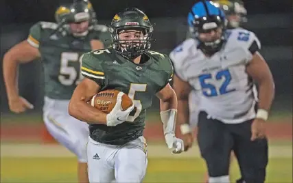  ?? Peter Diana/Post-Gazette ?? Running back-safety Cade Yacamelli is the first Penn-Trafford player to commit to a Power Five school since 2005. He is headed to Wisconsin.