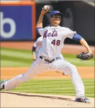  ?? Julie Jacobson / Associated Press ?? New York Mets starting pitcher Jacob deGrom delivers against the San Francisco Giants during the first inning Thursday in New York.
