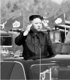  ?? KCNA/HANDOUT VIA REUTERS ?? North Korea’s leader Kim Jong Un watches a military drill marking the 85th anniversar­y of the Korean People’s Army