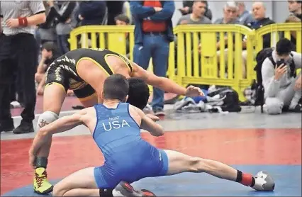  ??  ?? Above and below: Tyler Hunt competes at the 2019 NHSCA High School Nationals over the weekend of March 29-31 in Virginia Beach, Virginia.