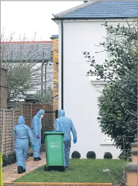  ?? Pictures: JONATHAN BRADY / PA, GETTY ?? Forensics officers search the Twickenham house for clues to the tragedy