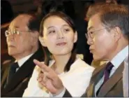  ?? BEE JAE-MAN — YONHAP VIA AP ?? South Korean President Moon Jae-in talks with Kim Yo Jong, North Korean leader Kim Jong Un’s sister, during a performanc­e of North Korea’s Samjiyon Orchestra at National Theater in Seoul, South Korea, Sunday.