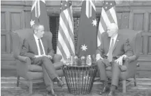  ?? AGENCE FRANCE PRESSE ?? US Vice President Mike Pence (right) meets with Australian opposition leader Bill Shorten in Sydney. The US supercarri­er Carl Vinson will arrive in the Sea of Japan in days, Pence told Australia amid high tensions with North Korea.