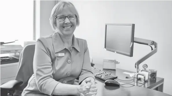  ?? [LIZ BEVAN / THE OBSERVER] ?? Kathy Duncan is retiring as branch manager of the Elmira Bank of Montreal after 25 years with the company. The branch is hosting an open house on May 25 for Duncan.