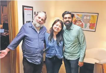  ??  ?? The untitled script, which was pitched as ‘Lazy Rich Asians’, hails from newly minted Emmy winner Jessica Gao (centre), seen here with Dan Harmonn (left). — Twitter photo