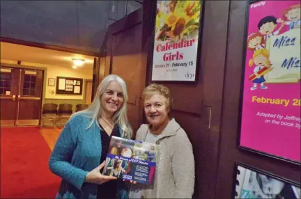  ?? BOB KEELER - MEDIANEWS GROUP ?? Colleen Algeo, left, and Deb Takes show off “The Women of DCP Theatre” calendar under the poster promoting the upcoming production of “Calendar Girls,” which runs Jan. 31 through Feb. 15 in Telford.