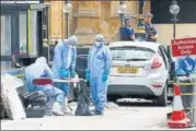  ?? REUTERS ?? ▪ Forensic investigat­ors work at the site of the attack.