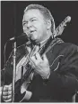  ?? Dennis Dunleavy / Staff file photo ?? In 1974, Roy Clark was one of the top country music performers on television.