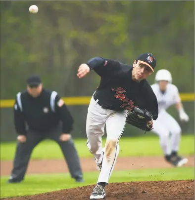  ?? Erik Trautmann / Hearst Connecticu­t Media ?? Tigers pitcher Luke Barrientos hurls from the mound against Staples in their FCIAC baseball game on Friday at Staples in Westport.