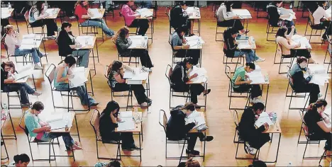  ??  ?? STRESSFUL Final exam-based subjects can place some pupils at a disadvanta­ge