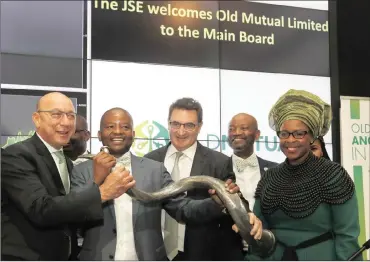  ?? PHOTO: SIMPHIWE MBOKAZI/AFRICAN NEWS AGENCY (ANA) ?? Old Mutual listed on the JSE yesterday. Chairperso­n Trevor Manuel, Old Mutual Africa chief executive Peter Moyo and Old Mutual Group chief executive Bruce Hemphill celebrate at the JSE.