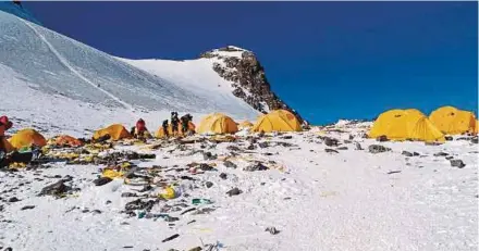  ?? AFP PIC ?? Discarded equipment and rubbish scattered around Camp 4 of Mount Everest last month.