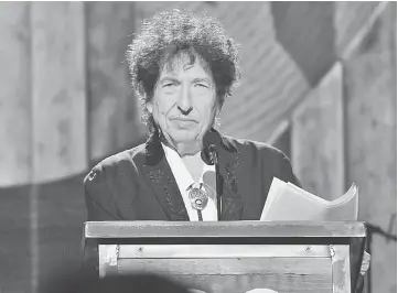  ??  ?? Bob Dylan speaks onstage at the 25th anniversar­y MusiCares 2015 Person Of The Year Gala honouring Bob Dylan at the Los Angeles Convention Centre on Feb. 6, 2015 in Los Angeles.