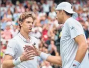  ?? AP ?? Kevin Anderson (left) and John Isner were involved in a sixandhalf­hour semifinal at Wimbledon earlier this year.