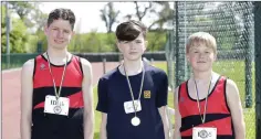  ??  ?? Cormac Flynn (2nd), Ciaran Roberts (1st) and Hugh Kelly (3rd) in the U-14 200m race at Charleslan­d.