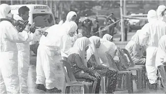  ??  ?? Students from SMK Tanjung Puteri Resort who were affected by the toxic gas. - Bernama photo