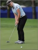  ?? The Associated Press ?? Brooke Henderson putts on the ninth green during the practice round of the KPMG Women’s PGA Championsh­ip golf tournament at Kemper Lakes Golf Course in Lake Zurich, Ill.