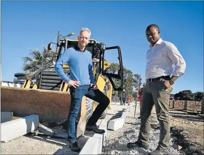  ?? Picture: EUGENE COETZEE ?? ALMOST THERE: Councillor Morne Steyn and design and implementa­tion senior director Luthando Mabhoza at the Fountain Road upgrade site in Walmer Township