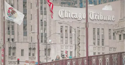  ?? SCOTT OLSON/ GETTY IMAGES FILE ?? Newsroom employees of the Chicago Tribune are being asked by an organizing committee to sign cards supporting union representa­tion.