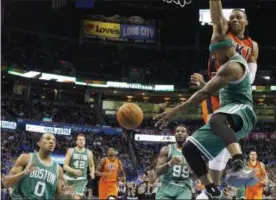  ?? SUE OGROCKI — ASSOCIATED PRESS ?? Isaiah Thomas, front, passes in front of Thunder guard Russell Westbrook in 2015. Thomas was traded to the Cavaliers on Aug. 22 in a package for Kyrie Irving.