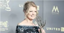  ?? RICHARD SHOTWELL/INVISION/AP ?? Mary Hart, winner of the lifetime achievemen­t award, poses in the press room at the 44th annual Daytime Emmy Awards Sunday in Pasadena, Calif.