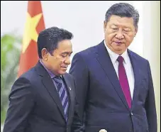  ?? GETTY FILE ?? Maldives president Abdulla Yameen (left) and his Chinese counterpar­t Xi Jinping in Beijing. Chinese presence in the island nation has been growing since Beijing opened an embassy in Male in 2011, about 37 years after India set up its mission there.