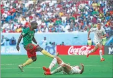  ?? (AFP) ?? Cameroon’s forward Vincent Aboubakar scores his team’s second goal during the Qatar 2022 World Cup Group G football match between Cameroon and Serbia at the Al Janoub Stadium on Monday.