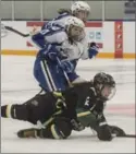  ??  ?? Sabres’ Claire Merrick hits the ice after being tripped by Sudbury’s Jamie Ricci.