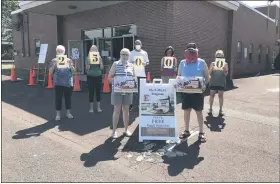  ?? PHOTO COURTESY OF EMMANUEL LUTHERAN CHURCH ?? On July 30, the Emmanuel Lutheran Church free meals program hit 25,000 distribute­d since its start in mid-March. Begun as an emergency help program, the meals are now expected to continue for the long-term.