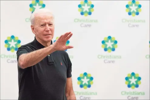  ?? JIim Watson / AFP via Getty Images ?? President-elect Joe Biden makes remarks after receiving the second course of the Pfizer-BioNTech COVID-19 vaccine at Christiana Hospital in Newark, Del., on Monday.