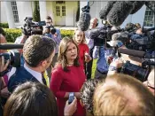  ?? DOUG MILLS / THE NEW YORK TIMES ?? White House Press Secretary Sarah Huckabee Sanders speaks to reporters outside the White House Thursday, saying she cannot comment on President Trump’s legal strategy.