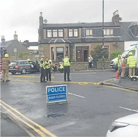  ??  ?? Emergency crews at the scene of the crash, which Gregor saw happen right in front of him.