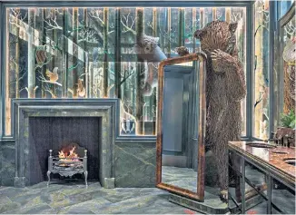  ??  ?? No peeking: a 7ft wicker bear in the gents at Annabel’s nightclub. Below, a leaping hare, £400, by Woody Fox