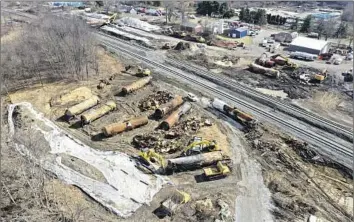  ?? Matt Freed Associated Press ?? THE STATE of the Norfolk Southern freight train derailment cleanup in East Palestine, Ohio, as of Friday. Sens. Sherrod Brown and J.D. Vance are leading co-sponsors of the Railway Safety Act of 2023.