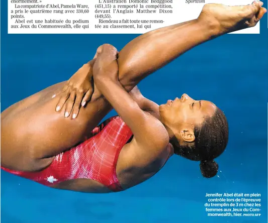  ?? PHOTO AFP ?? Jennifer Abel était en plein contrôle lors de l’épreuve du tremplin de 3 m chez les femmes aux Jeux du Commonweal­th, hier.