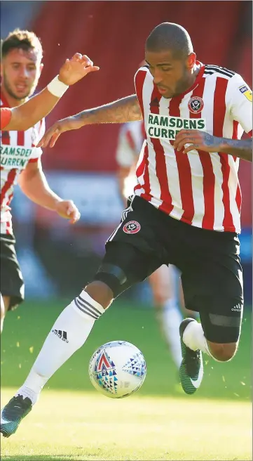  ??  ?? ON THE BALL: Leon Clarke shows his skill