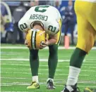  ?? RICK WOOD / MILWAUKEE JOURNAL SENTINEL ?? Green Bay kicker Mason Crosby reacts after missing his third field goal attempt during the Packers’ 31-23 loss to Detroit on Sunday in Detroit. Crosby missed four of five field goal attemps and an extra point. Coverage in Sports and JSOnline.com