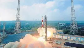  ?? PTI ?? The PSLVC40 rocket, carrying the Cartosat series along with 30 other satellites, lifts off from the first launch pad at Sriharikot­a, Andhra Pradesh, on Friday. The liftoff marks 100th launch by Isro.