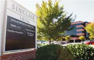  ?? AP FILE PHOTO/STEVE RUARK, ?? A sign marks Sinclair Broadcast Group Inc.’s headquarte­rs located in Hunt Valley, Md.