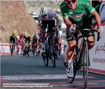  ?? AP ?? GuTSY: Caleb Ewan of Lotto Soudal approaches the finish line to win the second stage of the uAE Tour. —
