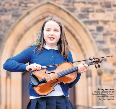 ?? ?? String success Poppy Donaldson, of Comrie Primary School, won the viola solo beginners’ class