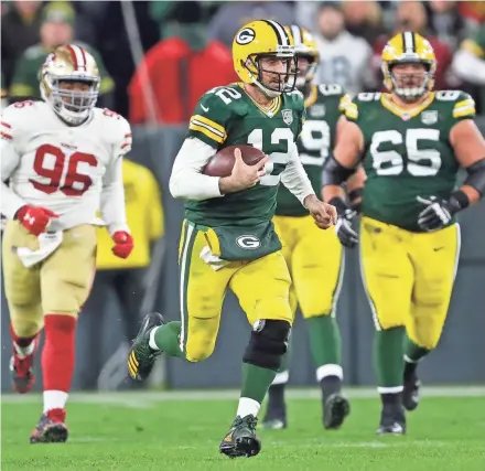  ?? DAN POWERS/USA TODAY NETWORK-WISCONSIN ?? Packers quarterbac­k Aaron Rodgers may be able to participat­e in the team’s first practice of game week. His practice has been limited since he suffered a knee injury in the first week of the season.