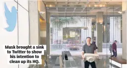  ?? ?? Musk brought a sink to Twitter to show his intention to clean up its HQ.
