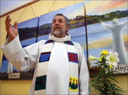  ?? DALE BOYD/Okanagan Weekend ?? Pastor Curtis Aguirre prepares his service at Our Redeemer Lutheran Church in Penticton ahead of Good Friday mass. Christians around the world are celebratin­g Easter — the resurrecti­on of Jesus — this weekend. See more on Easter in the Okanagan on...