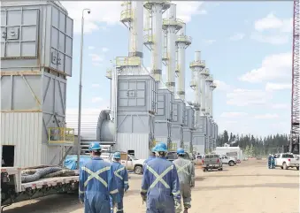  ?? VINCENT McDERMOTT ?? Employees at the Cenovus Christina Lake oilsands facility, south of Fort McMurray, begin their shift in May 2012. Cenovus believes it can continue to reduce costs, a spokesman says.