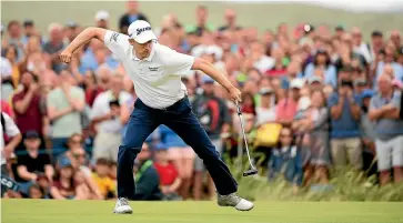  ?? GETTY IMAGES ?? Scotsman Russell Knox reacts to sinking a long birdie putt to beat Kiwi Ryan Fox in a playoff at the Irish Open in Donegal yesterday.