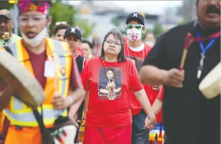  ?? PHOTOS: MICHELLE BERG ?? Diane Morin is among those walking from Saskatoon to North Battleford on the two-year anniversar­y of her daughter Ashley Morin’s disappeara­nce. Those taking part hope to raise awareness of the woman’s disappeara­nce, which remains a mystery.