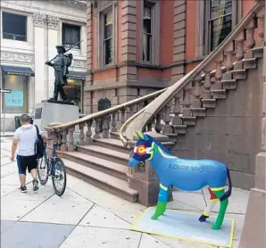  ?? Beth J. Harpaz Associated Press ?? THE CONVENTION host committee has put 57 fiberglass donkeys around Philadelph­ia.