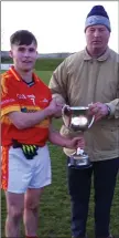  ??  ?? Horeswood captain David Murphy with Denis Nolan (Chairman).