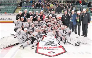  ?? MATTHEW MURNAGHAN/HOCKEY CANADA IMAGES ?? The Cape Breton West Islanders celebrate after winning the 2017 Telus Cup national midget hockey championsh­ip on Sunday in Prince George, B.C. The Islanders edged the Saint-François Blizzard of Quebec 5-4 in overtime.